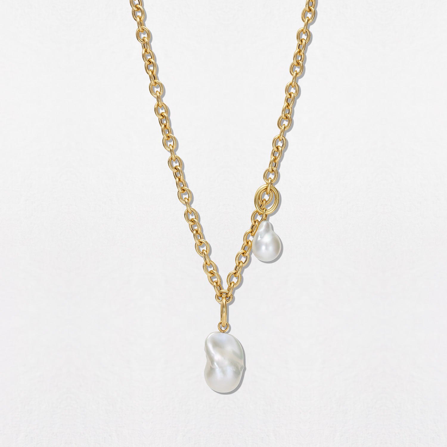 Handcrafted 18K yellow gold Baroque Pearl Charm Pendant II featuring a unique freshwater baroque pearl and a handmade detachable oval clasp by Isabella Roux
