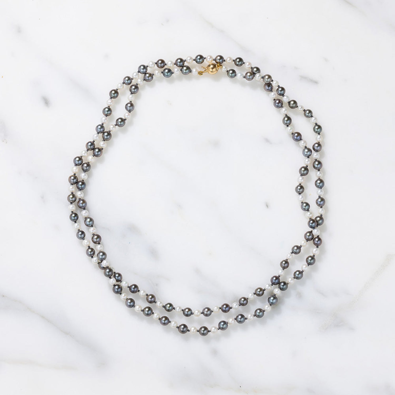 Handcrafted Akoya Pebble Grey & White Pearl 32" Necklace featuring mixed tone pearls and 18K yellow gold clasp by Isabella Roux