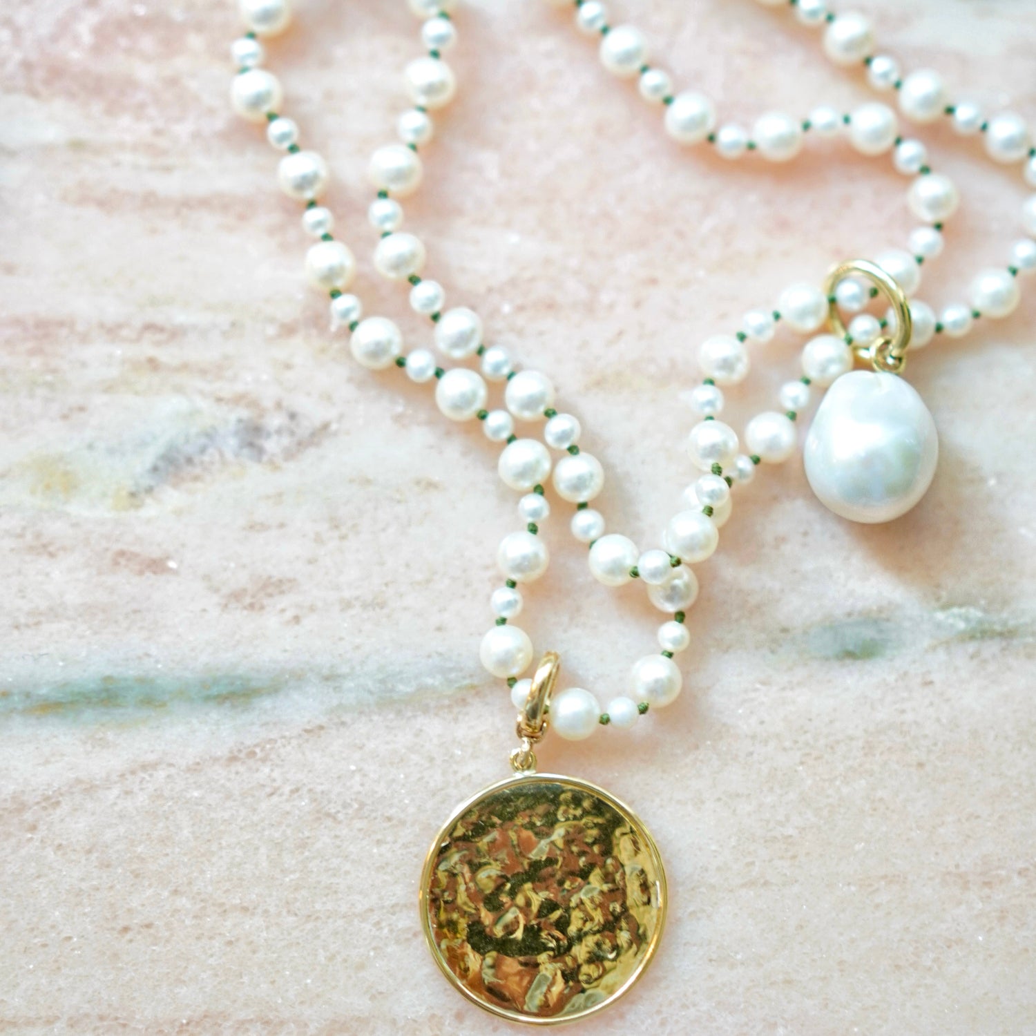 Handcrafted Pebble Pearl 15" Mini Necklace with freshwater pearls and 3.5 - 4.5mm and 18K yellow gold clasp on green thread with beaten. gold pendant by Isabella Roux.