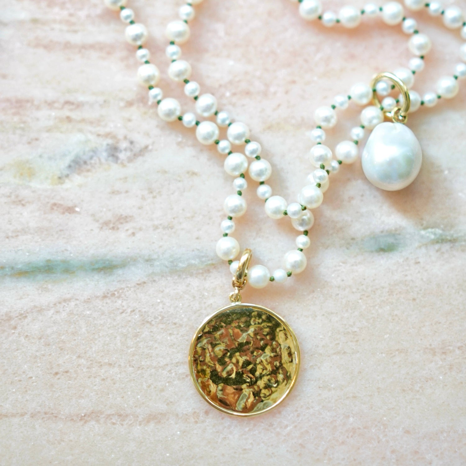Hand-beaten 18K yellow gold Sun Disc Charm Pendant I featuring a 27mm textured gold disc with a smooth bezel and detachable clasp by Isabella Roux