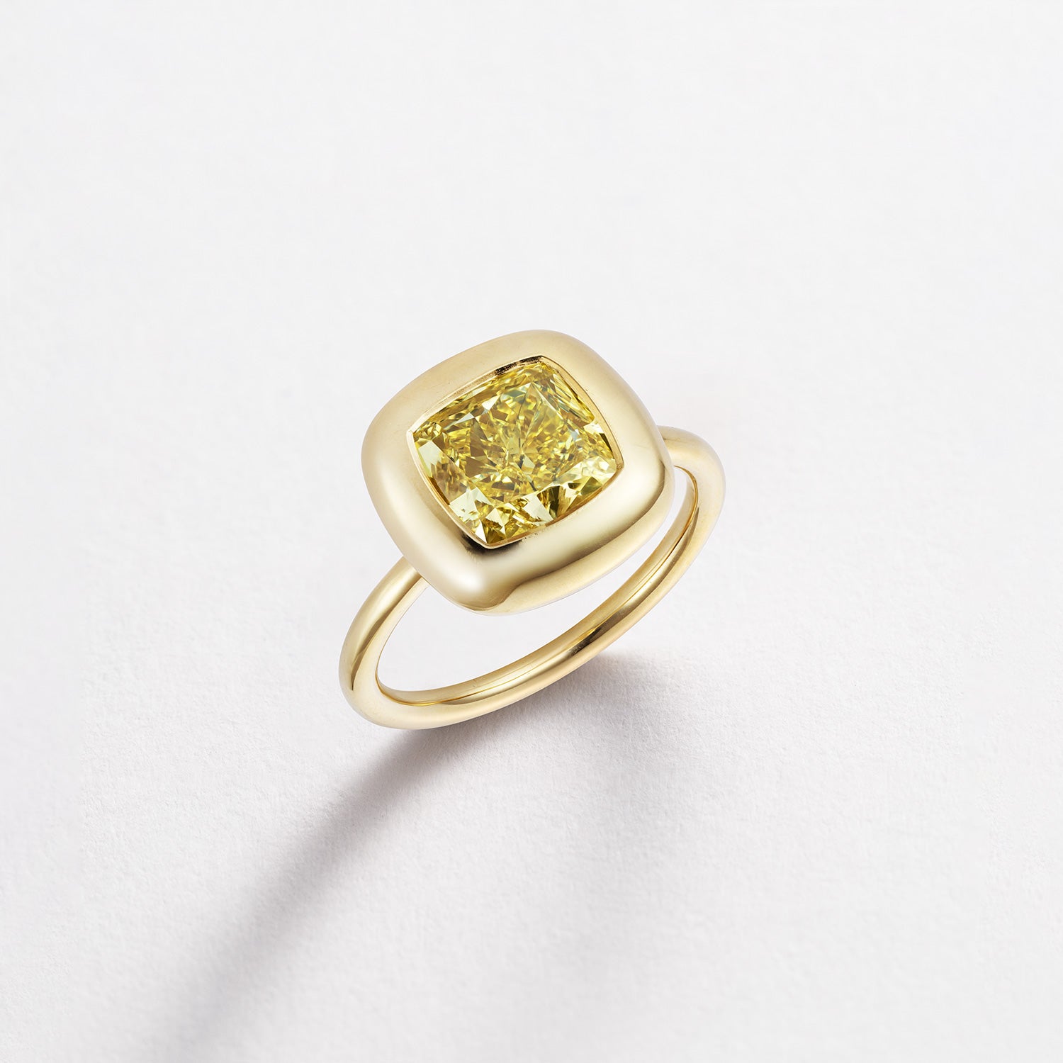 Handcrafted 18K yellow gold Yellow Diamond Cushion Cup Ring featuring a 2.21ct cushion cut lab grown yellow diamond set in a bezel style cup by Isabella Roux