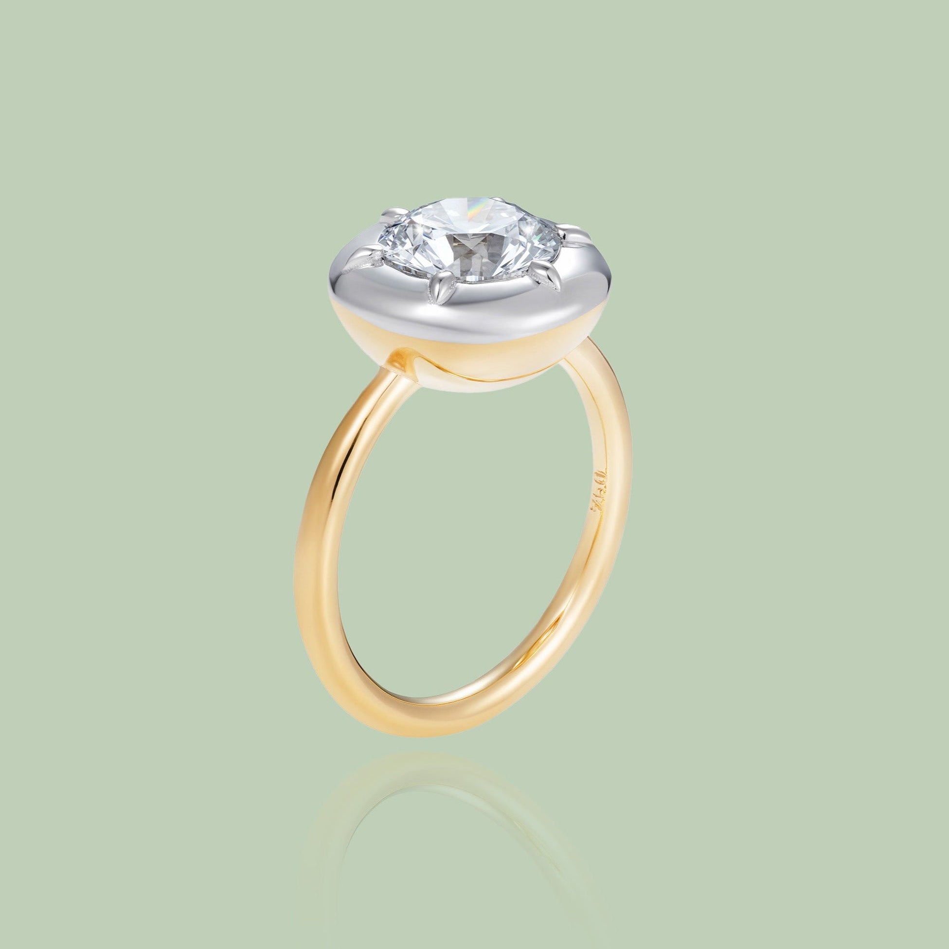 Bespoke 18K white and yellow gold Diamond Cup Ring featuring a 1.52ct round brilliant lab grown diamond set in a signature bezel style cup by Isabella Roux.