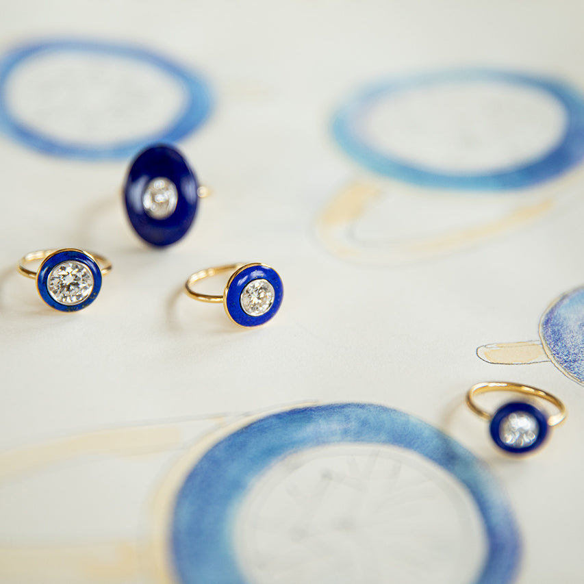 Various hand-carved 18K yellow & white gold Diamond & Lapis Pebble Ring featuring lab grown diamond set inside hand-carved lapis lazuli by Isabella Roux.