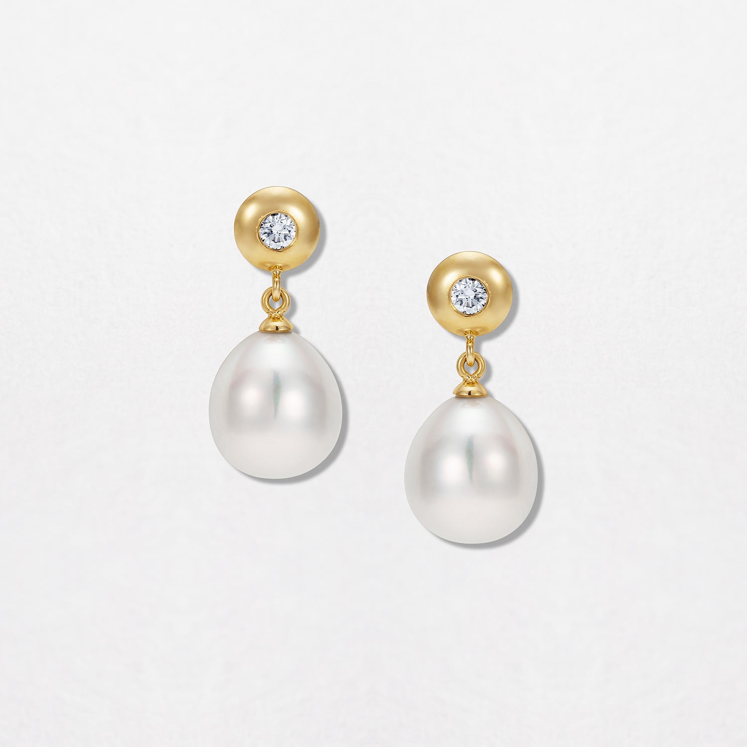 Handcrafted 18K yellow gold Diamond & Pearl Pebble Earrings featuring 0.40ct total weight round brilliant diamonds and a pair of white Akoya drop-shaped pearls by Isabella Roux.