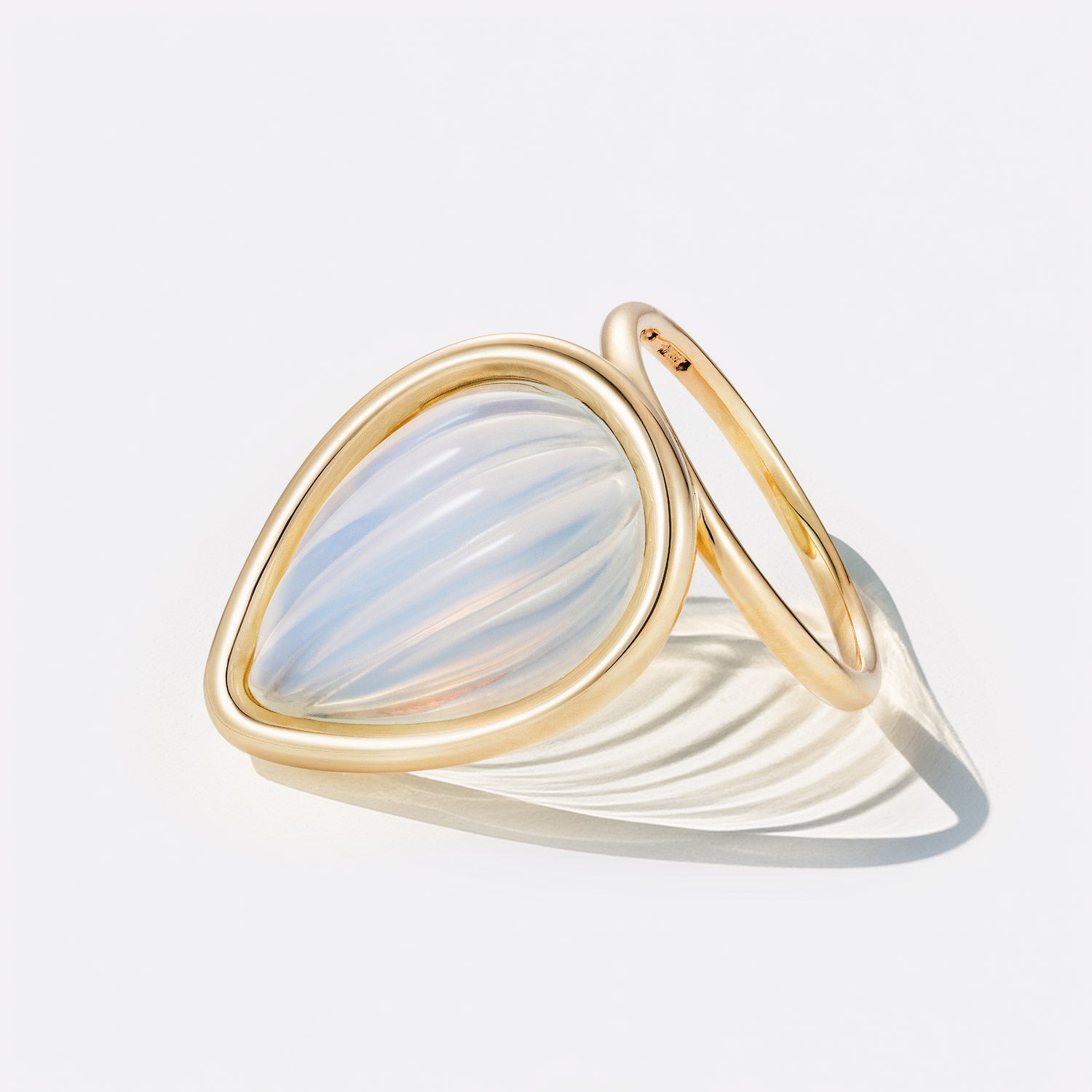 Hand-carved 18K yellow gold Pebble Moonstone Ring featuring a 3.4ct pear-shaped hand-carved moonstone surrounded by organic rounded gold by Isabella Roux