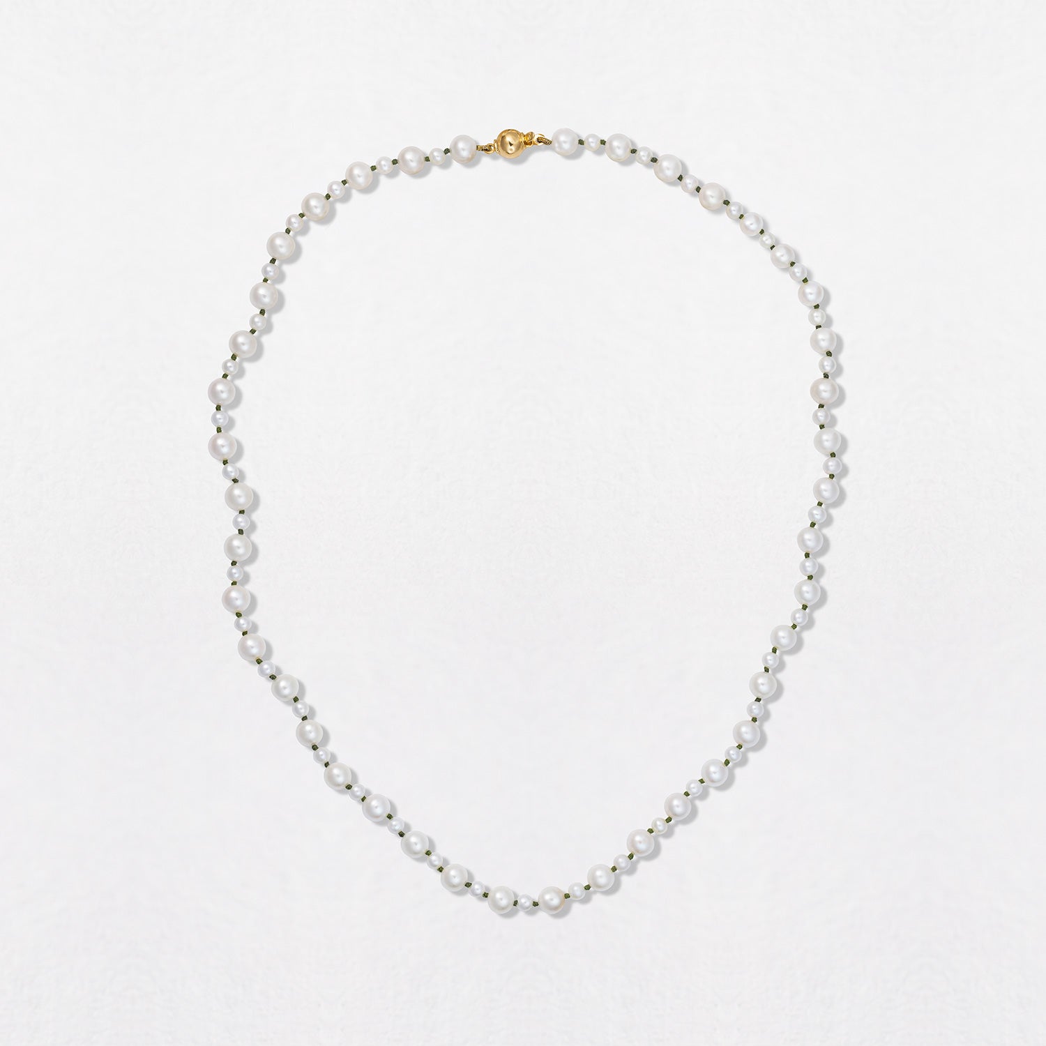 Handcrafted Pebble Pearl 22" Necklace featuring freshwater pearls in 3 - 5mm and 18K yellow gold clasp by Isabella Roux.