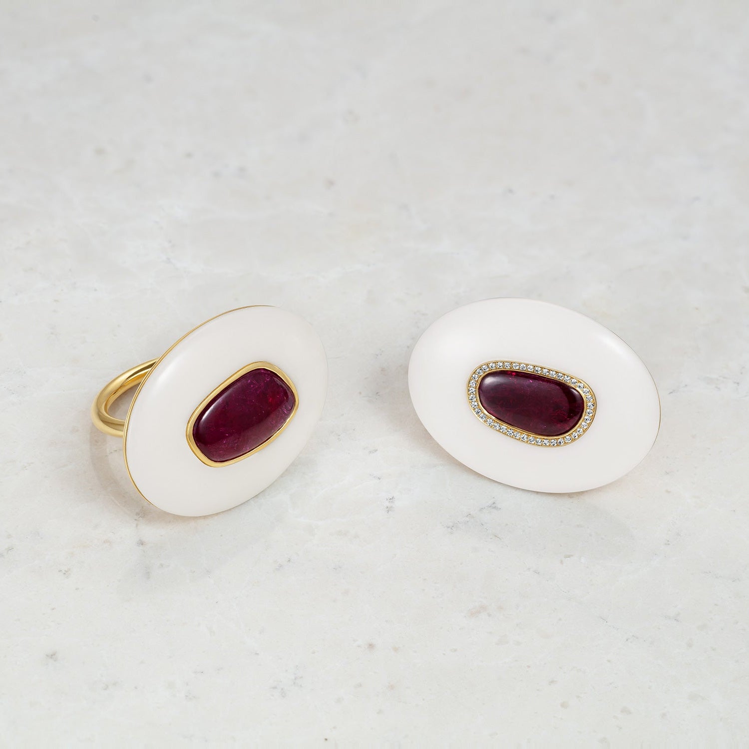 Handcrafted 18K yellow gold Ruby & Opal Pebble Rings featuring a 5.23ct ruby slice surrounded by a hand-carved white opal by Isabella Roux.