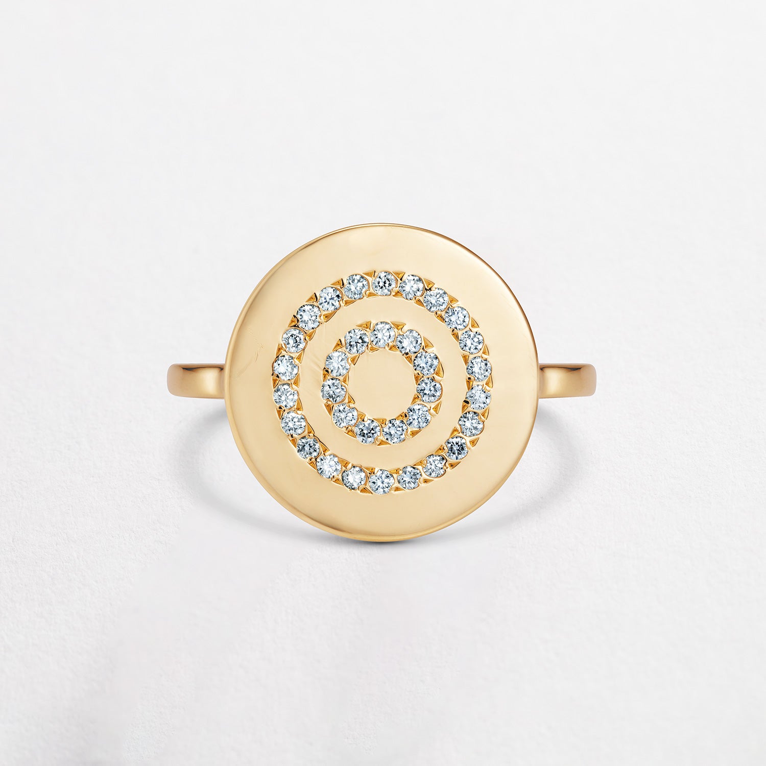 Handmade 18K yellow gold Signature Circles Ring featuring white diamond accents by Isabella Roux.