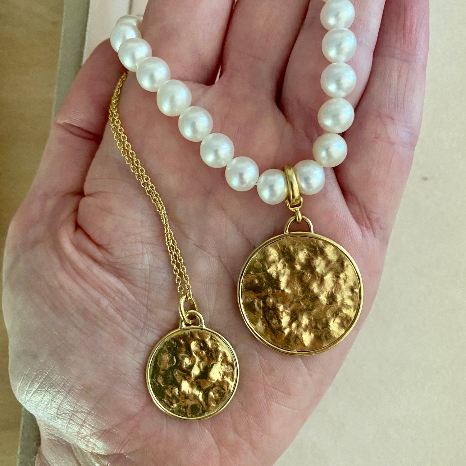 Hand-beaten 18K yellow gold Sun Disc Necklace featuring a 20mm textured gold disc with a smooth bezel on an 18" chain by Isabella Roux