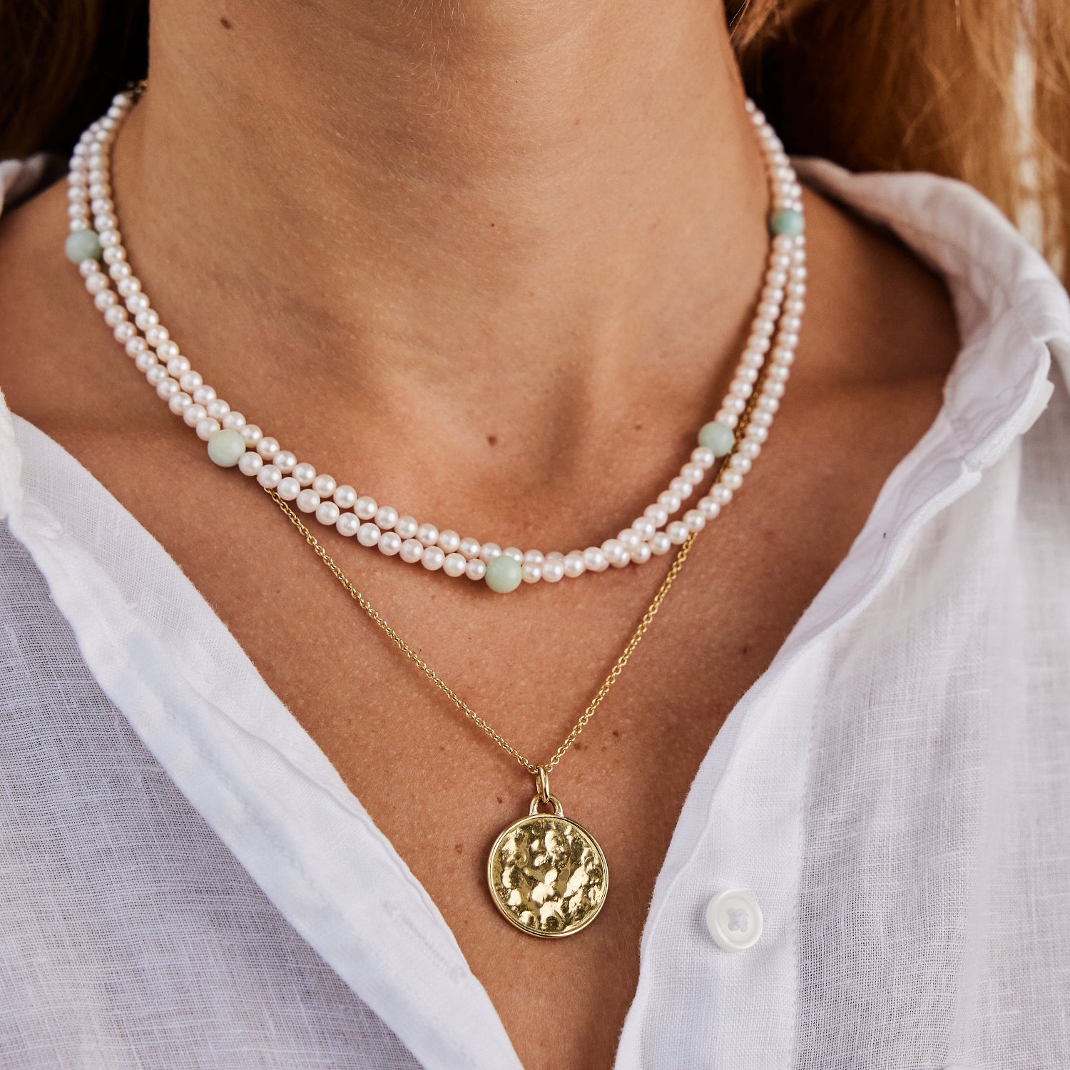 Hand-beaten 18K yellow gold Sun Disc Necklace featuring a 20mm textured gold disc with a smooth bezel on an 18" chain by Isabella Roux