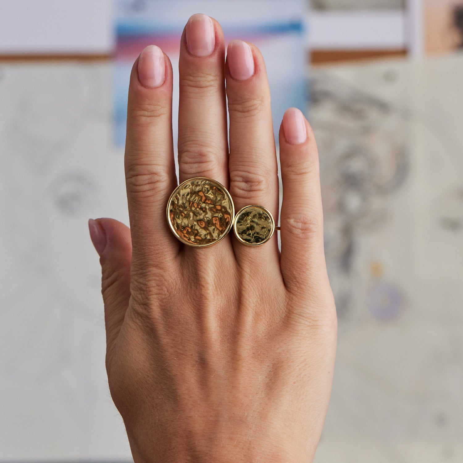 Hand-hammered 18K yellow gold Sun Disc Ring featuring a 15mm hand-hammered disc on a slim band by Isabella Roux