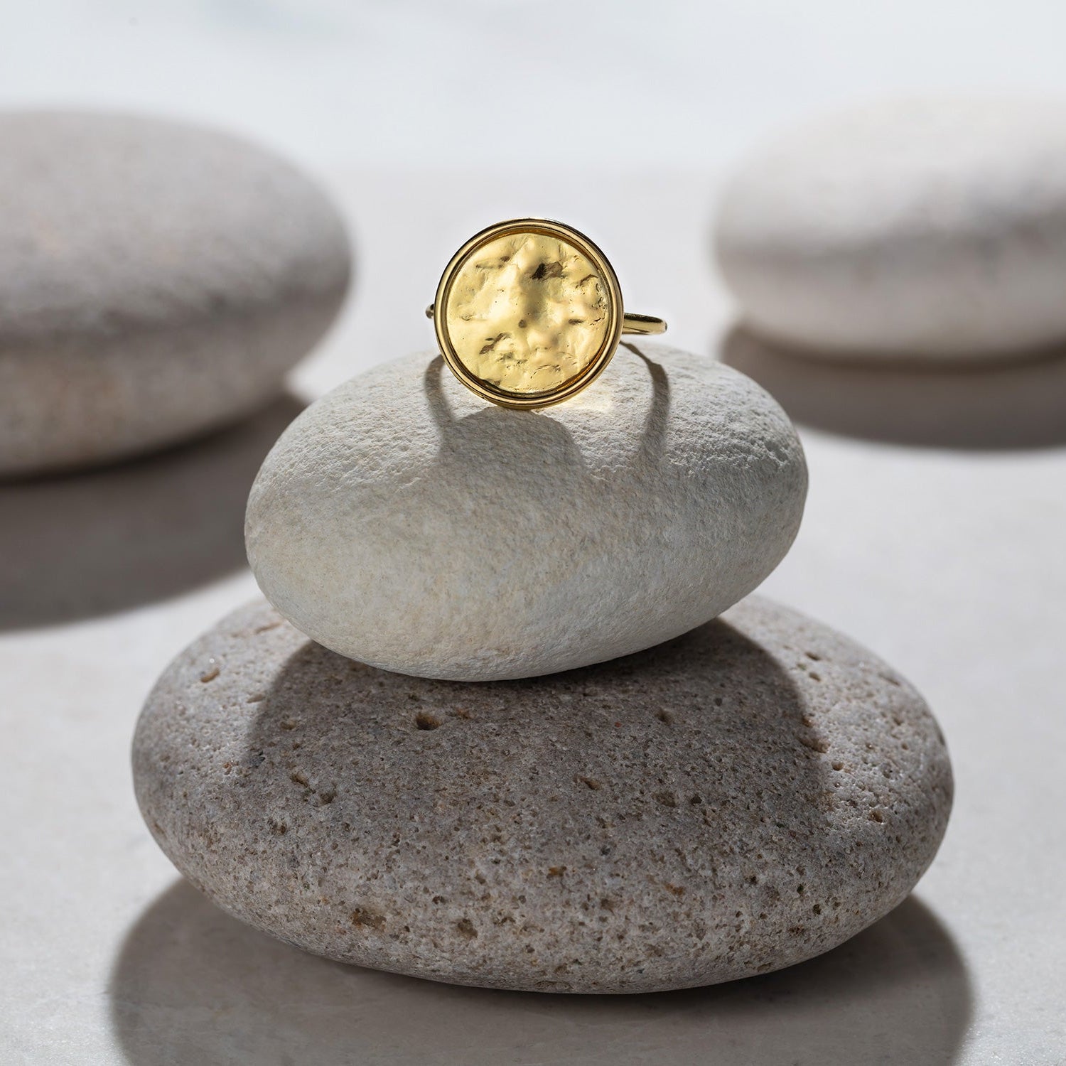 Hand-hammered 18K yellow gold Sun Disc Ring featuring a 15mm hand-hammered disc on a slim band by Isabella Roux